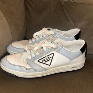 Prada White and Grey Logo Sneakers! Retail price $1000 Resale price: $450